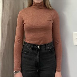 Long sleeve burnt orange top, size XS, never worn